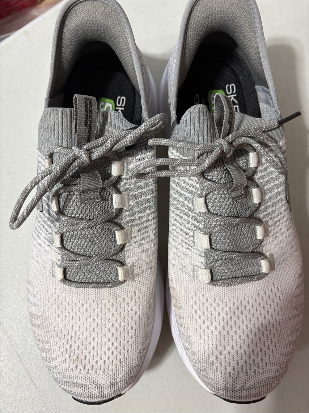 Sketchers slip on. Shoes come from a pet free and smoke free environment.